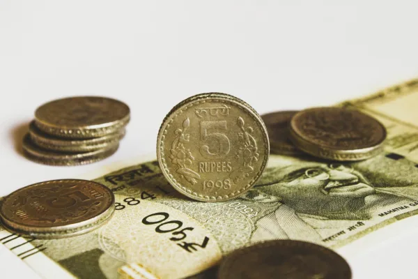 SBI Forecasts Rupee Stabilization as RBI Measures Target $65 Billion Inflow
