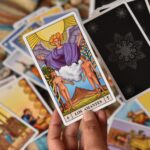Tarot card reading with focus on The Lovers card, emphasizing symbolism and mysticism.
