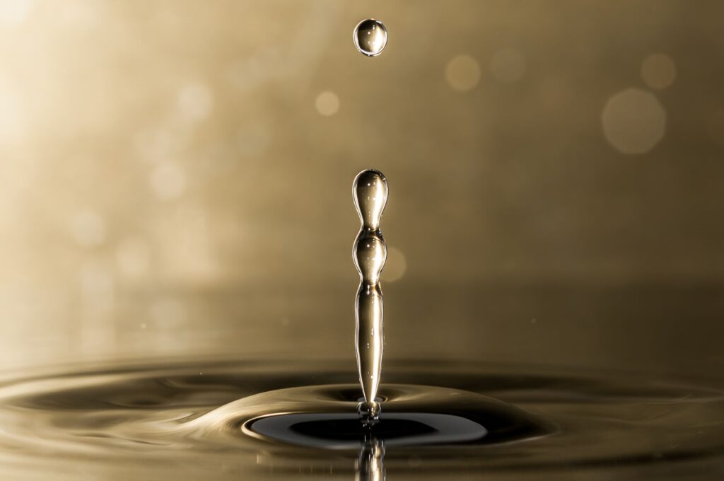 Captivating macro shot of water drop impact captured in stunning detail.
