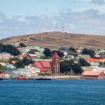 Charming harbor view of Stanley with colorful Victorian houses in the Falkland Islands.