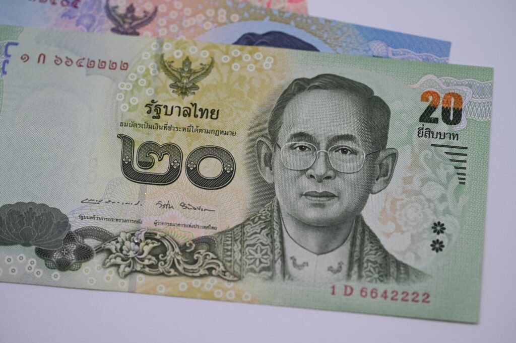 Detailed image of a 20 Thai Baht banknote highlighting traditional Thai design and currency features.