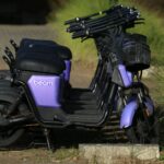 Purple Beam e-scooters parked in a row on a sunny day, ideal for urban transport themes.