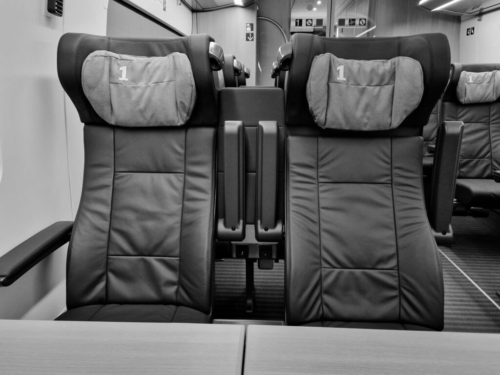 Monochrome view of first class train seats in Hamburg, Germany.
