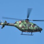 Indian Army helicopter flying at Aero India in Bengaluru.
