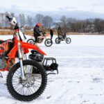 Motorcycles with studded tires racing on a frozen lake in Webster, New York.
