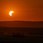 Stunning solar eclipse at sunset, captured over the landscape in Garešnica, Croatia.