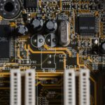 Detailed view of a motherboard with visible microchips and circuits.