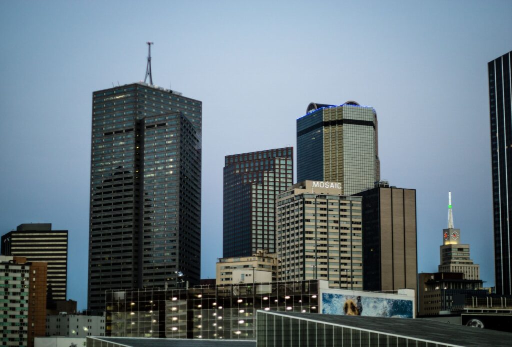 Skyline of Dallas, Texas showcasing modern skyscrapers during daytime.