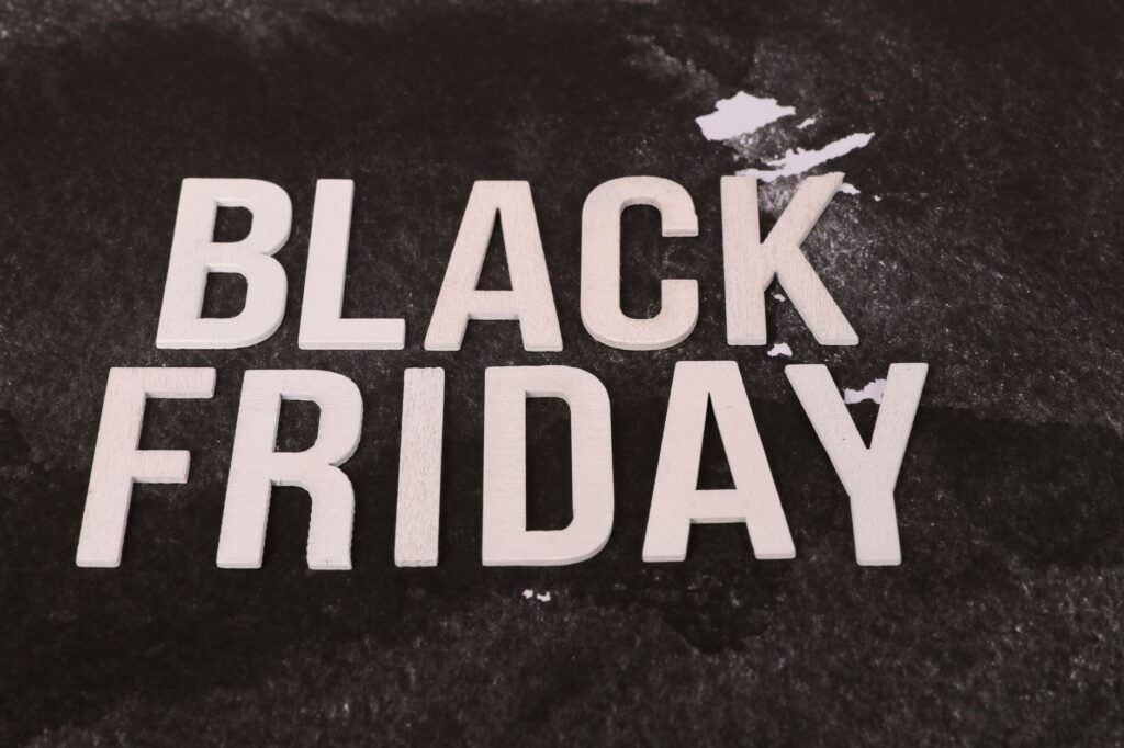 Bold 'Black Friday' text on a textured dark background, ideal for promotions.