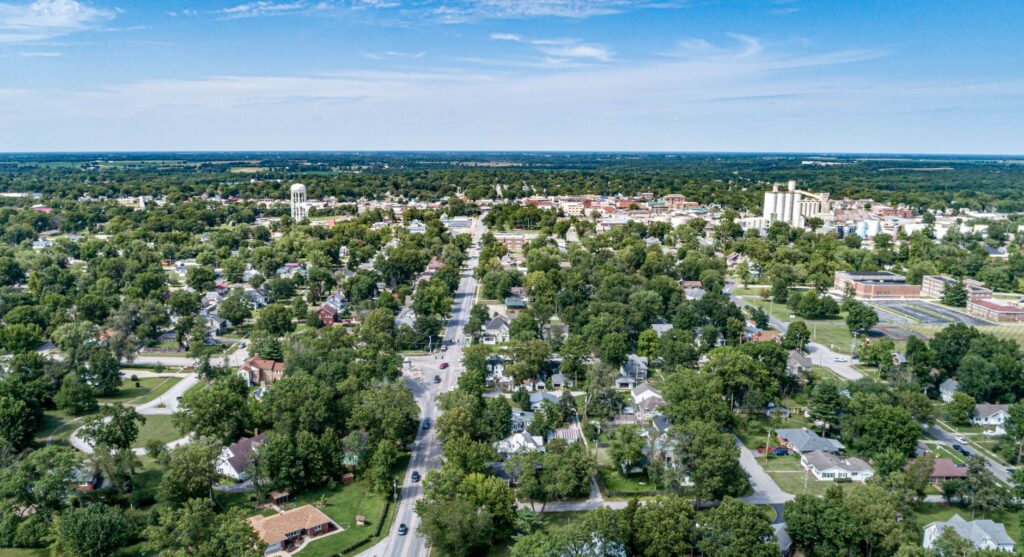 Explore the scenic suburban landscape of Mexico, Missouri from an aerial perspective.