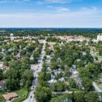 Explore the scenic suburban landscape of Mexico, Missouri from an aerial perspective.