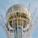 Close-up view of the iconic Baiterek Tower in Astana, Kazakhstan on a clear day.