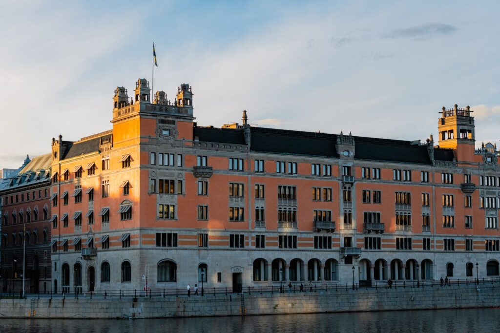 Captivating view of the historic Swedish Parliament building in Stockholm during sunset.