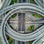 Aerial view of a modern highway interchange in Abidjan, showcasing intricate road design.
