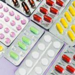 Vibrant blister packs showcasing a variety of colorful pills and capsules, a modern take on healthcare.