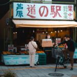 Explore a bustling market street in Kyoto, showcasing local vendors and fresh produce.