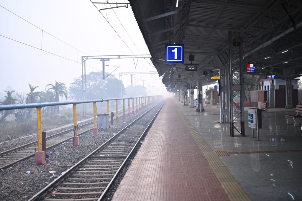 Deserted train platform in Haldia, West Bengal, India during the day.