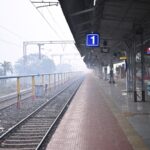 Deserted train platform in Haldia, West Bengal, India during the day.