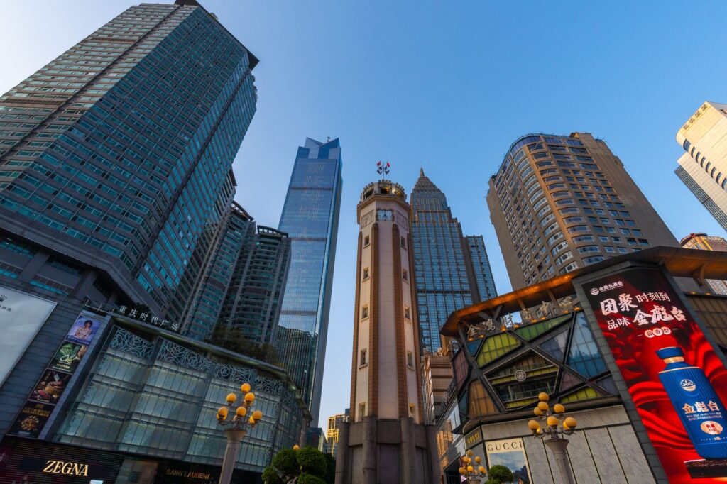 Urban skyline of Chongqing city center with iconic skyscrapers and vibrant city life.